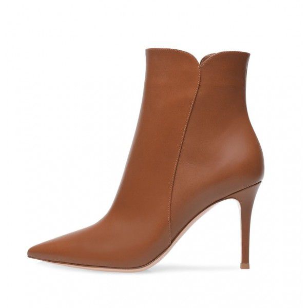 Women's pointed toe ultra high heel zippered ankle...